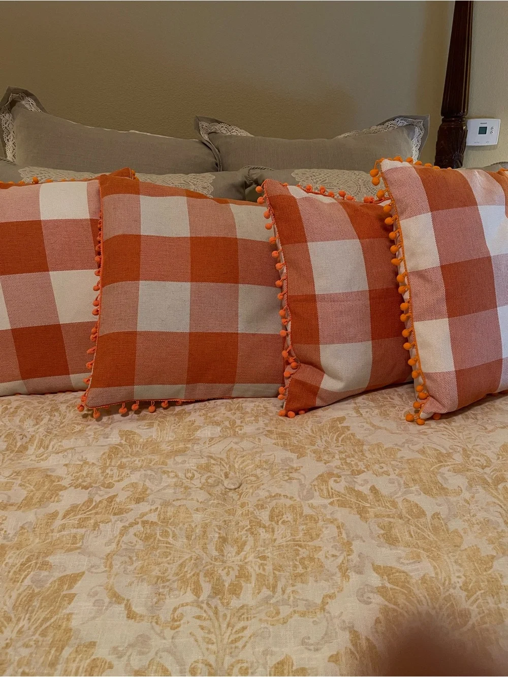 Orange Buffalo Check Decorative Throw Pillows with Pom Trim (x 4)